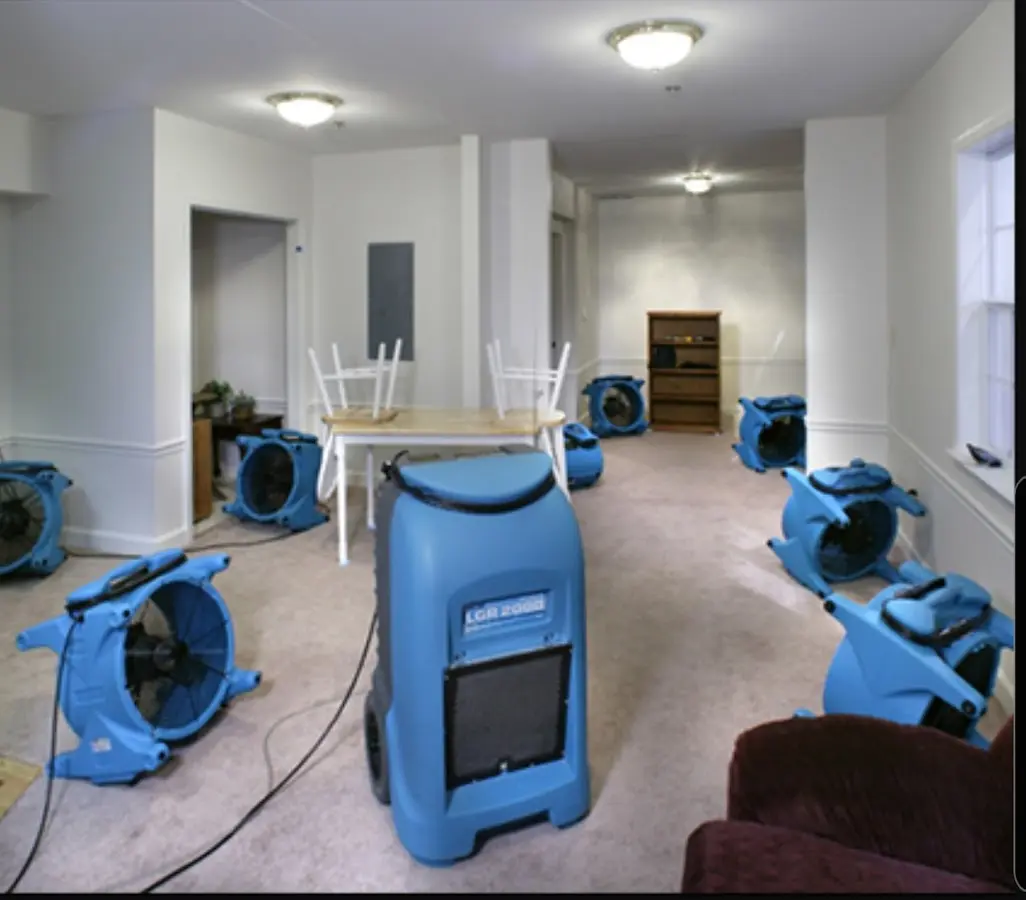 Air movers and dehumidifier setup for Water Extraction & Removal in Linton Hall